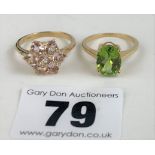 2 x 9k gold dress rings – green stone ring size L and white stone ring size N/O, total w: 5.1 gms