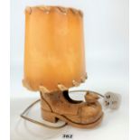 Wren Man boot table lamp with shade, 7” long x 12” high