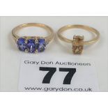 2 x 9k gold dress rings – blue stone ring size L and yellow stone ring size M, total w: 3.5 gms
