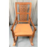 Mouseman rocking chair with tan leather seat 20”w x 18”d x 38”h