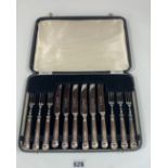 Cased set of stainless steel and plated 6 dessert knives and 6 forks