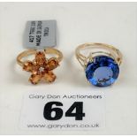 2 x 9k gold dress rings – blue stone ring size L/M, orange stone ring L/M, total w: 6.4 gms