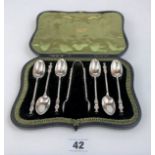 Cased set of 6 silver twist apostle teaspoons and tongs. Total w: 2.8 ozt