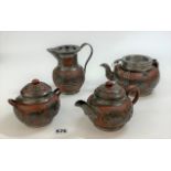 4 piece terracotta and metal Chinese tea set with 2 teapots, water jug and sugar bowl. Marked and