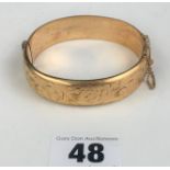 9ct gold metal core bangle, 8.5” circumference, w: 23.5 gms