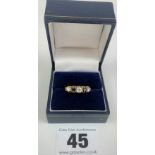 9k gold ring with blue and white stones, size N, w: 3.3 gms