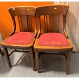 Pair of oak chairs with red material studded seats, 18”w x 17”d x 33”h