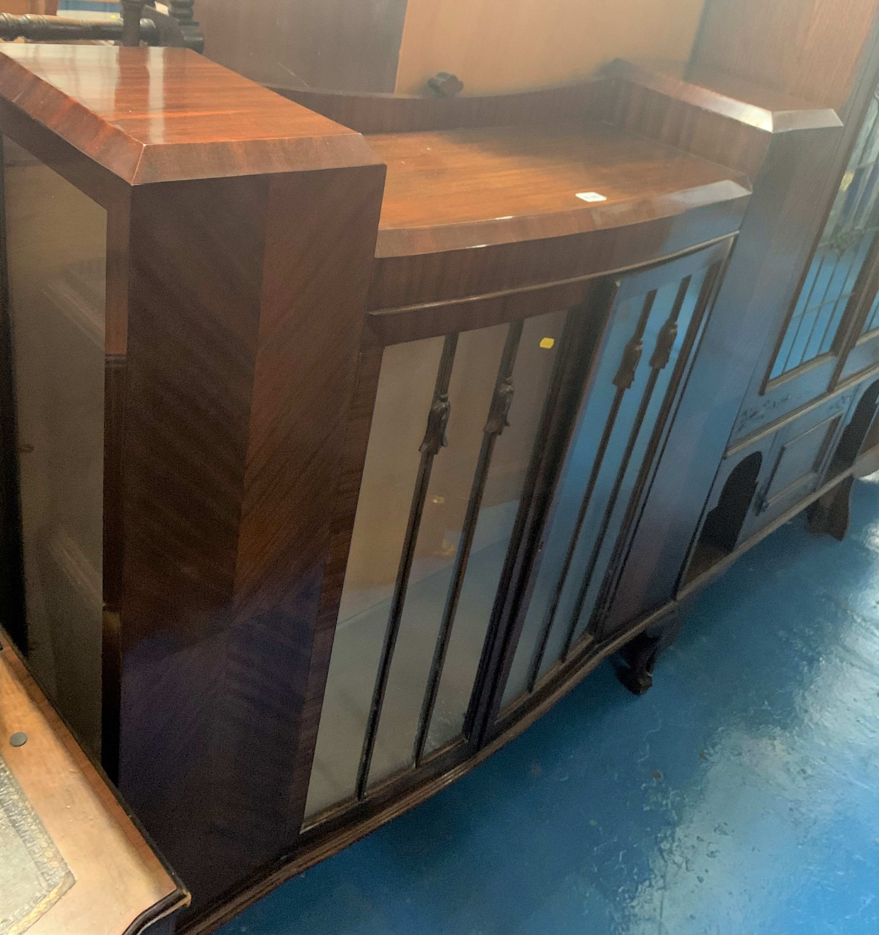 Mahogany china cabinet with claw/ball feet, 2 opening glass doors and glass shelves, 46.5”w x 12”d x