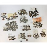 Bags of assorted foreign and UK coins and banknotes
