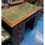 Mahogany desk with green leather top, brass handles and 9 drawers, 46”w x 22.5”d x 29”h