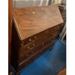 Mahogany bureau with fitted inlaid interior and 4 drawers. 2 escutcheons missing. 40”w x 21”d x 42”