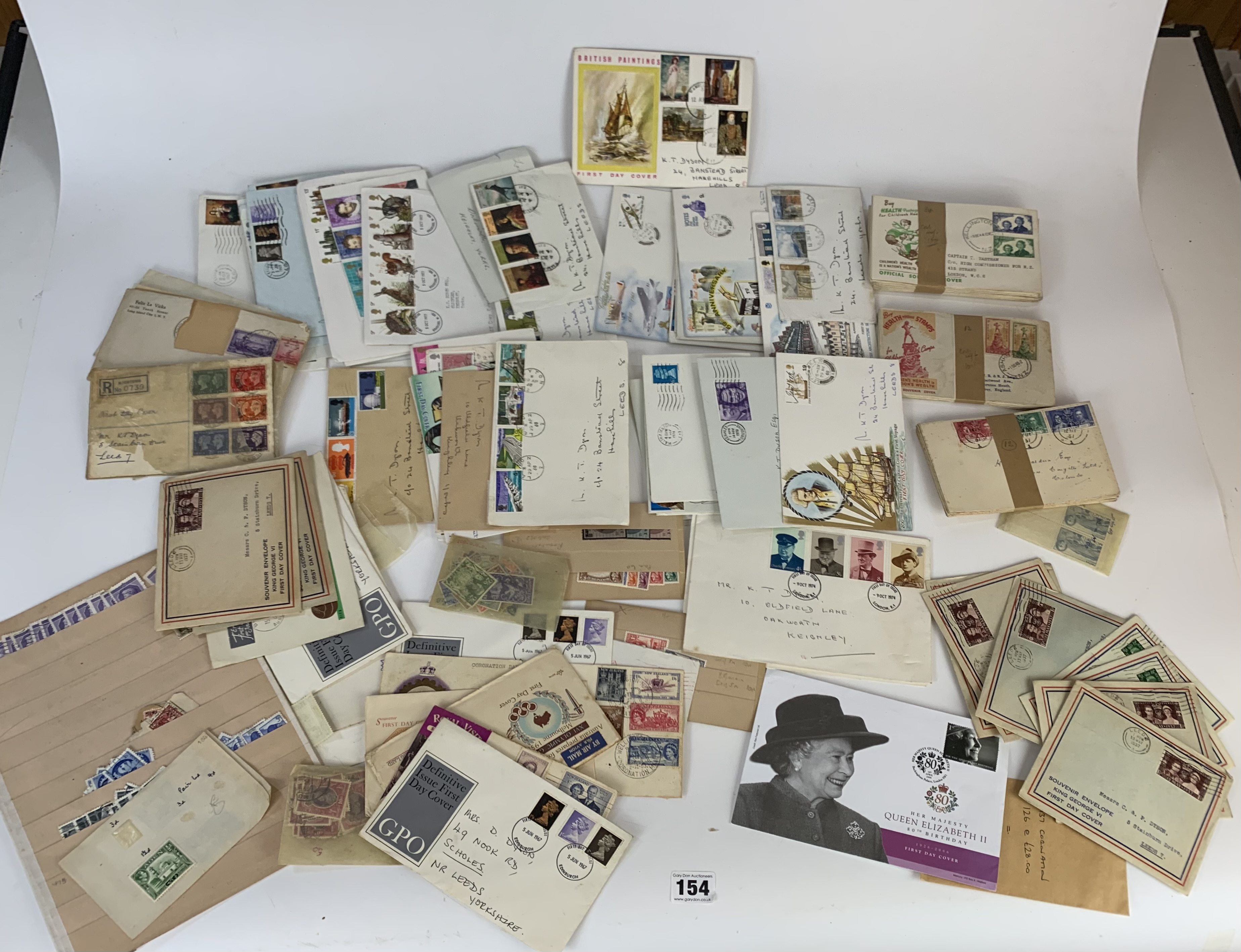 Box of assorted old first day covers, stamps and envelopes inc. Ceylon