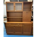 G-Plan teak wall unit with 2 glass cupboards, drop cupboard and shelves at top, 3 cupboards and