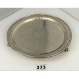 Round silver engraved tray on 3 claw feet, 8” diameter, w: 8.5 ozt