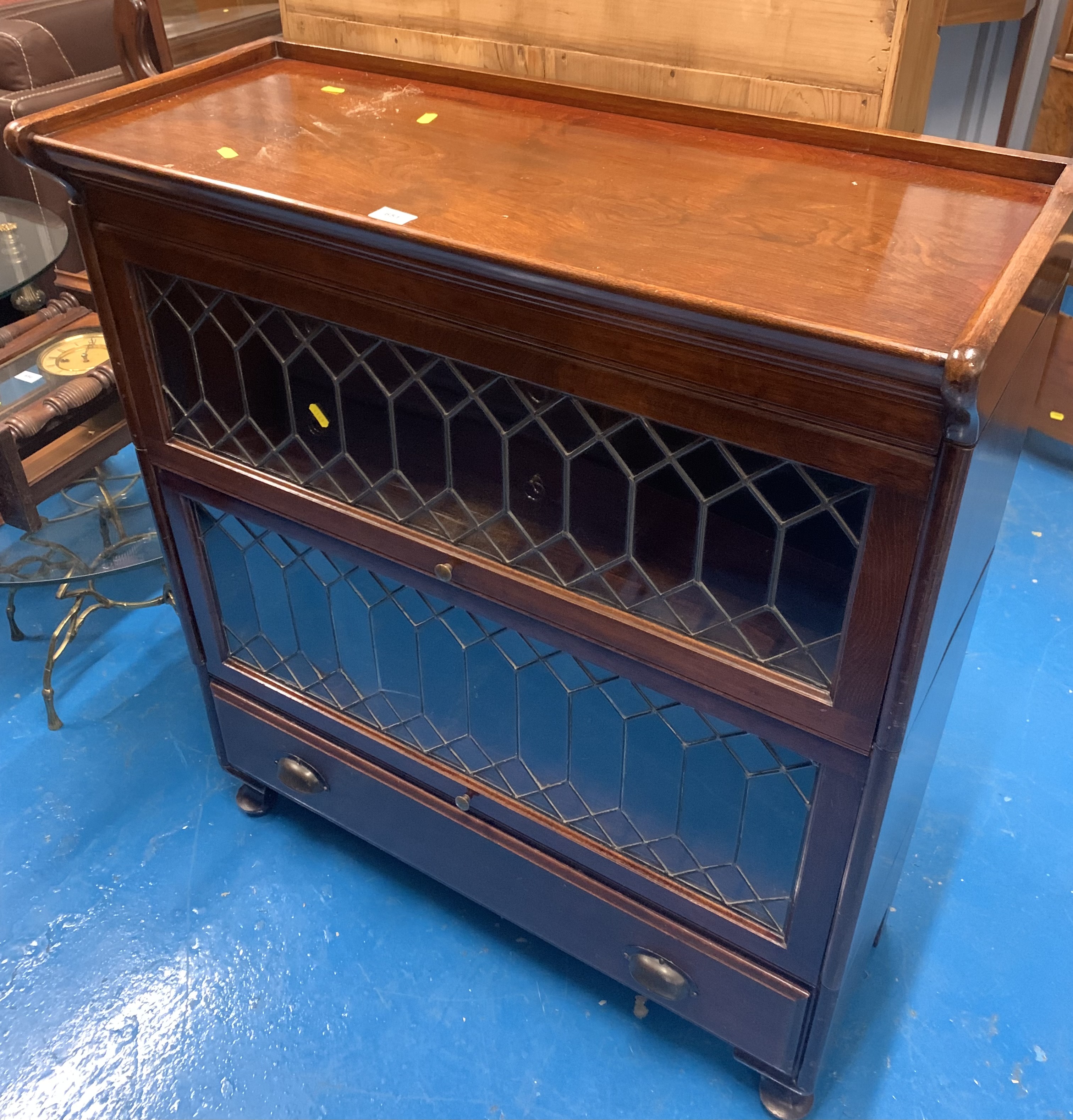 Mahogany Globe Wernicke style leaded light bookcase with 2 sections and base drawer, 34”w x 14”d x