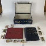 Small case of sets of cigarette cards and 2 cigarette card albums