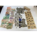 Box of assorted foreign banknotes, loose crowns and pre-decimal UK coins
