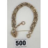 9k gold gate bracelet with heart lock, length 7”, w: 13.1 gms