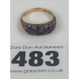 9k gold and purple stone ring, size M, w: 3.2 gms