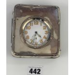 Large silver plated pocket watch in silver fronted case. Watch 2.75” diameter, case 4.5” x 4”. Total