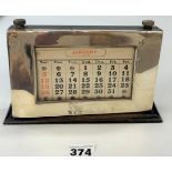 Silver fronted and wooden calendar 8” wide x 5.5” high, total w: 13.4 ozt