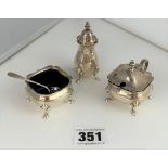 3 piece silver cruet set inc. Silver salt pot with blue glass liner, silver mustard pot with blue