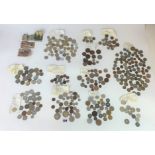 Bags of assorted foreign and UK coins and banknotes