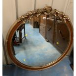 Large carved gilt framed circular mirror, 37” diameter