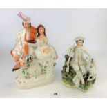 2 Staffordshire flat back figures – soldier and dog 10” high and Scottish couple 14.5” high