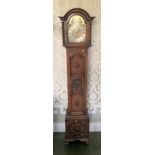 Carved Oak Grandmother Brass Faced Clock with Pendulum and Key 69" High.