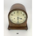 Oak 3-hole arch shaped mantle clock with pendulum. 11”w x 13”h