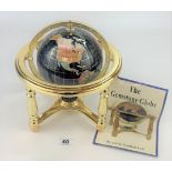 The Gemstone Globe by Aston Trading Ltd. With certificate. 10” high x 9” diameter. Good condition