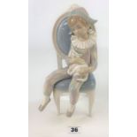 Lladro figure – Harlequin boy with cat on chair. Good condition