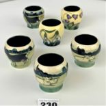 6 Moorcroft egg cups 2” high – 4 Farmyard patterns and 2 Spring Festival patterns