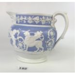 Unmarked Jasper ware style blue/white jug 7”high