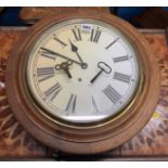 Round wall clock with key