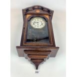 Inlaid 3-hole wall clock with pendulum and key, 26” long