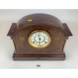 Inlaid mahogany 2-hole mantle clock with brass pillars and pendulum, 14” w x 12”h