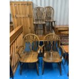 Oak plank refectory dining table and 6 wheelback chairs (4 + 2 carvers). Table 71” long x 32”w x