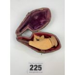Small cased meerschaum pipe with carved dog and amber ends, 3” long