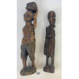 2 carved wooden tribal figures, largest 18” long