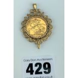 Full sovereign 1913 in 9k gold holder, total w: 12.1 gms