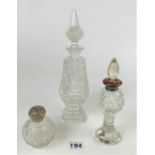 3 cut glass scent bottles – 1 silver/enamel banded, 1 silver topped and 1 tall (10”high)