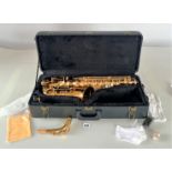 F.F. alto saxophone in black case