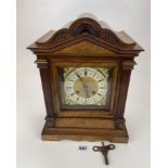 Walnut 2-hole mantle clock marked ‘Deutsch Patent 62975’ with pendulum and key, 11”w x 7”d x 15”h