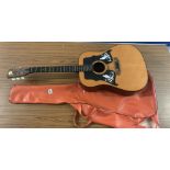 Kay K550 acoustic guitar with soft red case