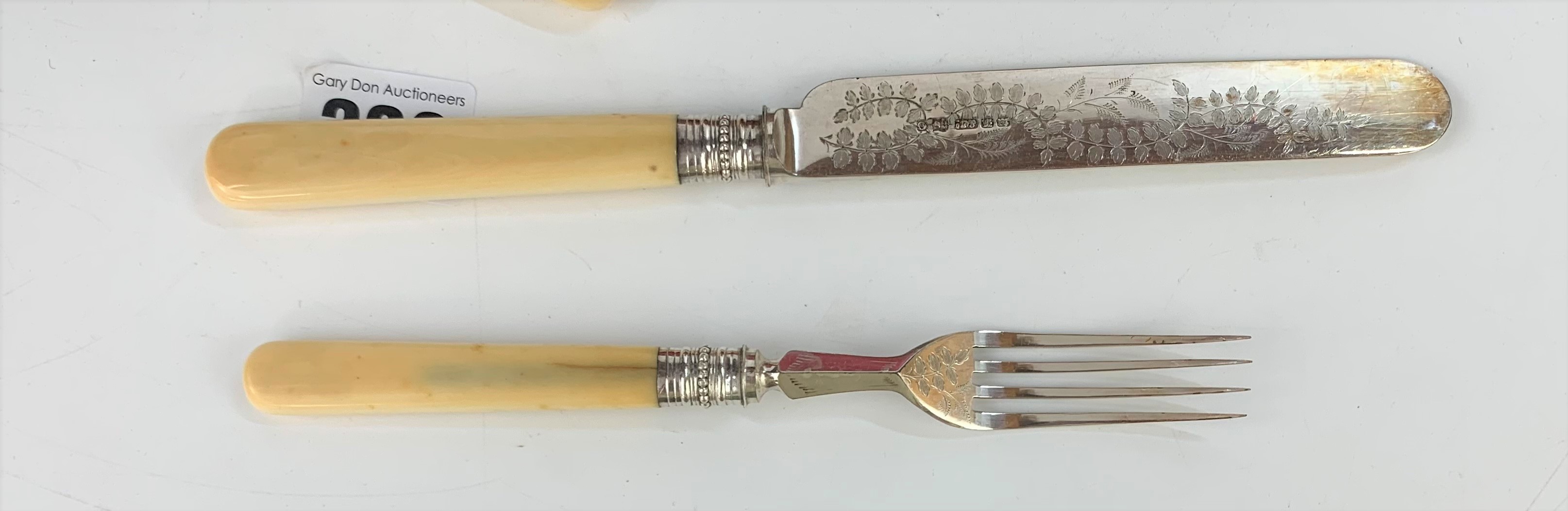 Cased canteen of 11 engraved plated and bone handled knives and 11 forks (1 knife and 1 fork - Image 7 of 8