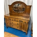 Mahogany carved mirror back sideboard with 2 cupboards and 4 drawers. 54” long x 19.5”d x 65”h