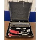 Hohner piano accordion in hard case with instructions