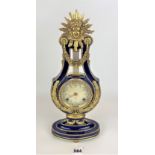 Franklin Mint Marie-Antoinette blue gilt and enamel mantle clock with key and instructions, 15”